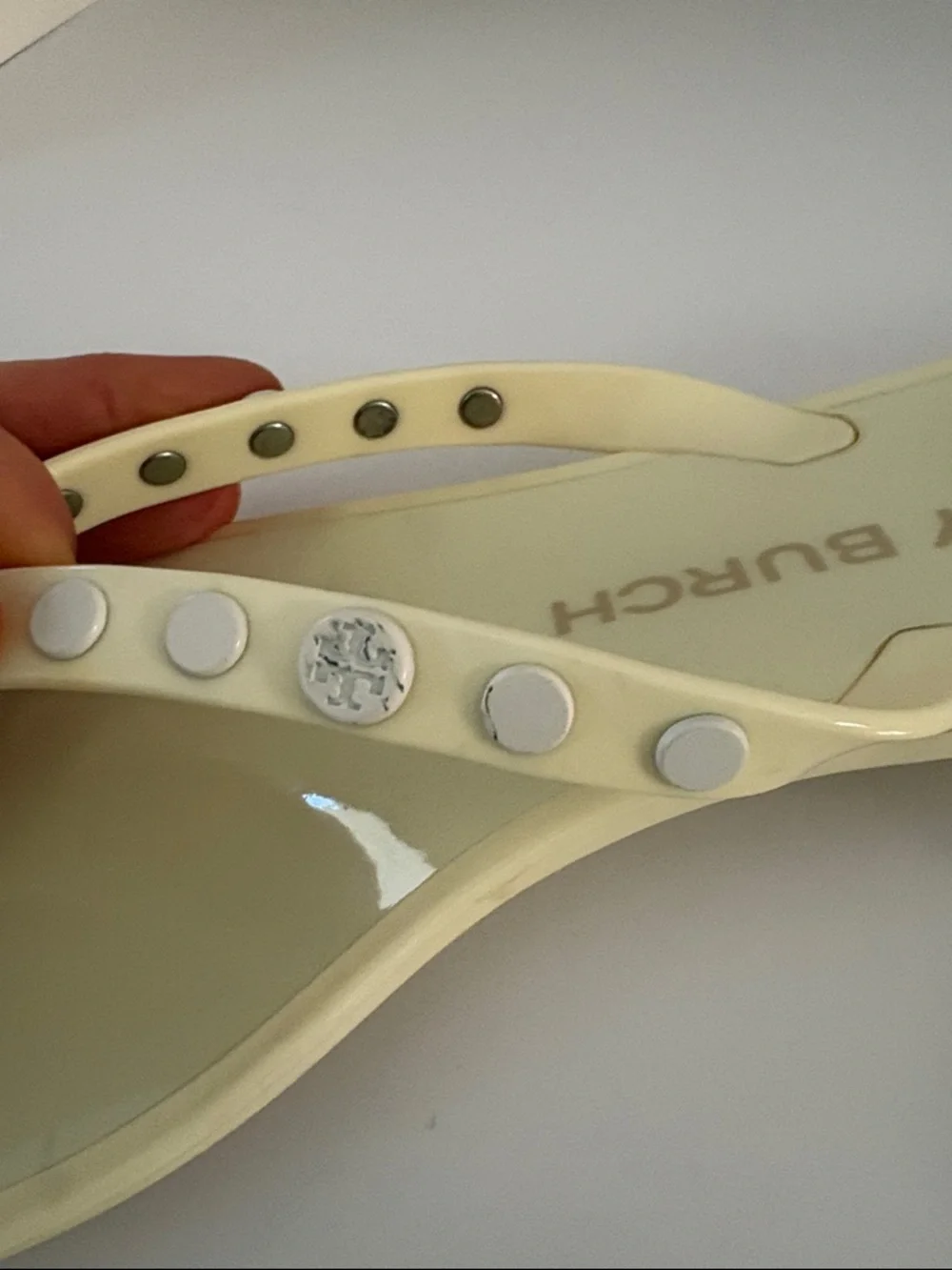 Tory Burch Ivory/pale yellow thong jelly  sandals size 7. Studded w/metal logos